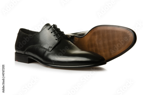 Photo: Fashion concept with male shoes on white Fashion concept with male shoes on white
