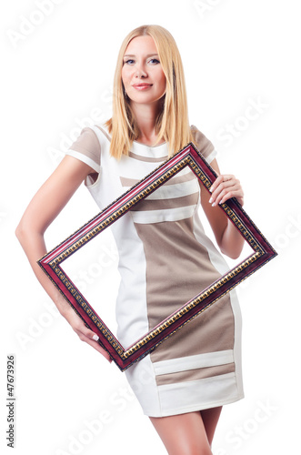Photo: Woman with picture frame on white Woman with picture frame on white