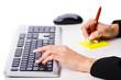 Hands working on the keyboard