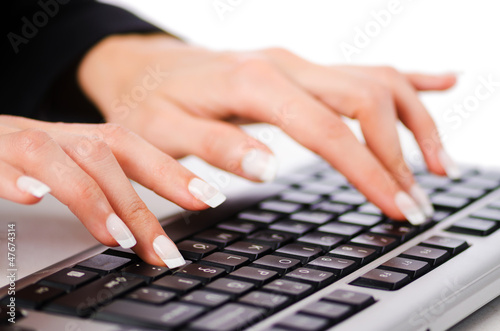 Photo: Hands working on the keyboard Hands working on the keyboard