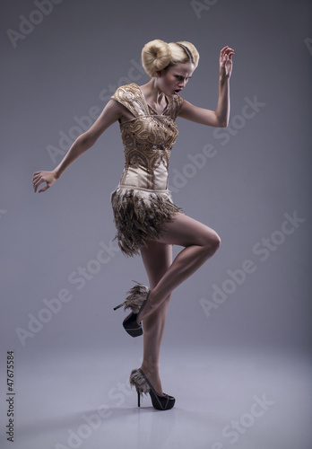Photo: beautiful caucasian woman in gorgeous dress beautiful caucasian woman in gorgeous dress