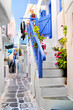 Beautiful whitewashed street in the old town of Mykonos, Greece