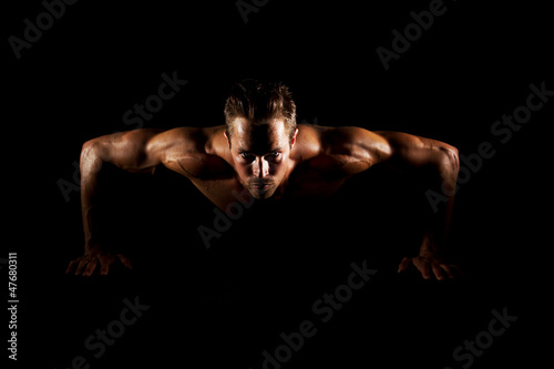 Photo: Man doing pushups Man doing pushups