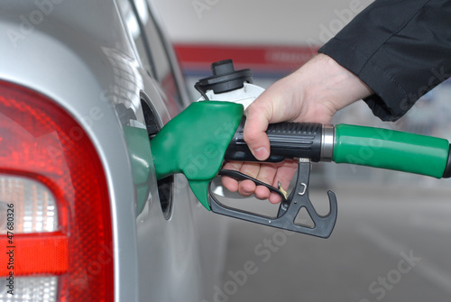 Photo: Car fueling at the gas station Car fueling at the gas station