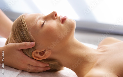 Photo: Receiving a relaxing head massage Receiving a relaxing head massage