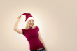 pretty blonde woman wearing a christmas hat having fun