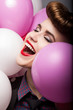 Elation. Happy Laughing Girl with Colorful Air Balloons - Sales