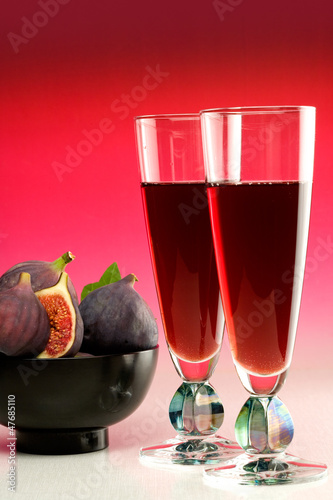 Photo: Two glasses of red wine with fresh figs Two glasses of red wine with fresh figs