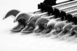 Closeup of iron spanners set over a white
