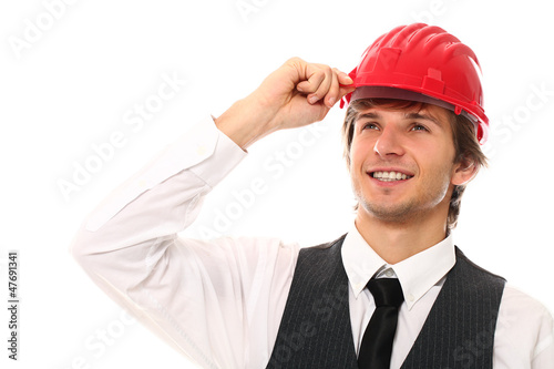 Photo: Young and handsome man in red helmet portrait Young and handsome man in red helmet portrait