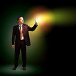Businessman with light shining