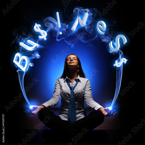 Photo: young businesswoman and word Business young businesswoman and word Business