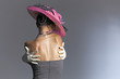 Photo: Young stylish woman with purple retro hat Young stylish woman with purple retro hat