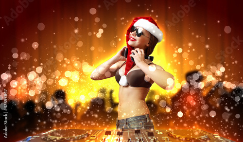 Photo: Female dj in christmas wear Female dj in christmas wear