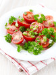 Tomato salad with spring onion and fresh parsley