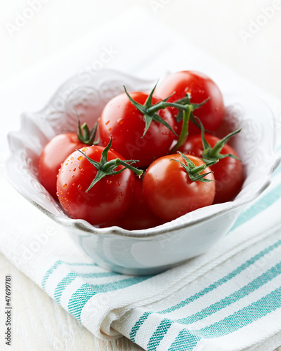 Photo: Fresh cherry tomatoes in a bowl Fresh cherry tomatoes in a bowl