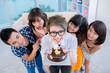 Boy with birthday cake