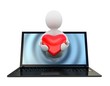 Valentine's Day. The person with red heart from the laptop monit