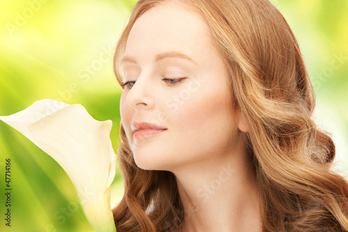 Photo: beautiful woman with calla flower beautiful woman with calla flower
