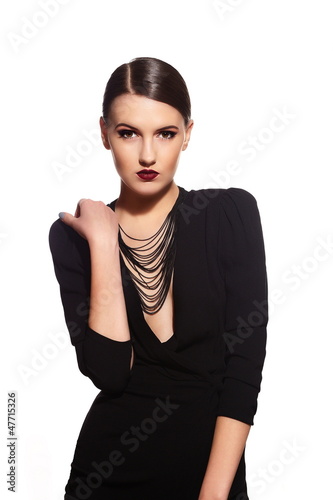 Photo: glamor sexy model with red lips,bright makeup in black dress glamor sexy model with red lips,bright makeup in black dress