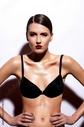 Photo: glamor sexy model with red lips,bright makeup in black lingerie glamor sexy model with red lips,bright makeup in black lingerie