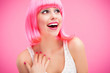 Woman wearing pink wig and laughing