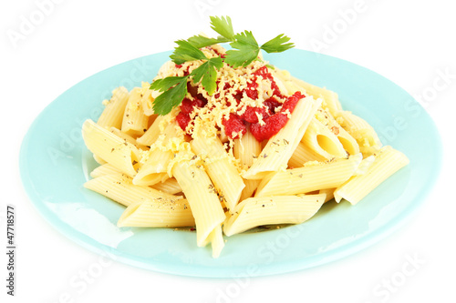 Photo: Rigatoni pasta dish with tomato sauce isolated on white Rigatoni pasta dish with tomato sauce isolated on white