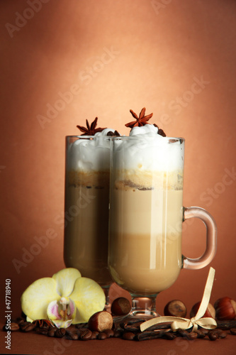 Photo: Fragrant coffee latte in glasses cups with spices, Fragrant coffee latte in glasses cups with spices,