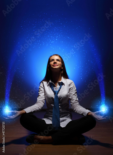 Photo: Business woman meditating Business woman meditating