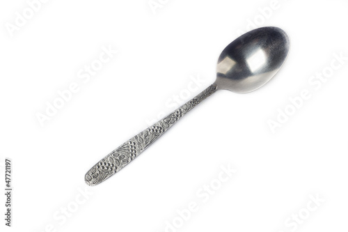 Photo: spoon on the white background spoon on the white background