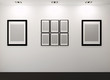 Gallery Interior with empty frames on wall