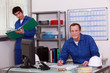 apprentice and trainer in workshop