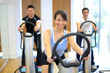 Woman on vibration plate in a gym