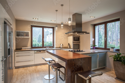 Photo: Travertine house - view of a kitchen Travertine house - view of a kitchen