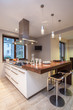 Travertine house - kitchen with TV