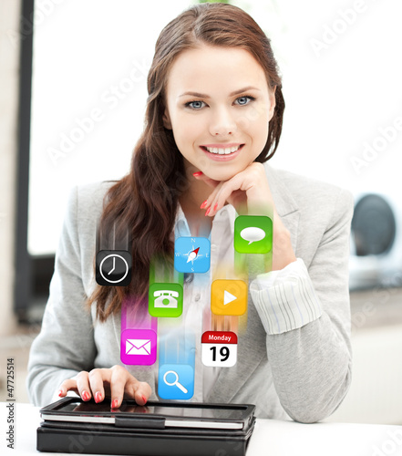 Photo: happy woman with tablet pc computer happy woman with tablet pc computer