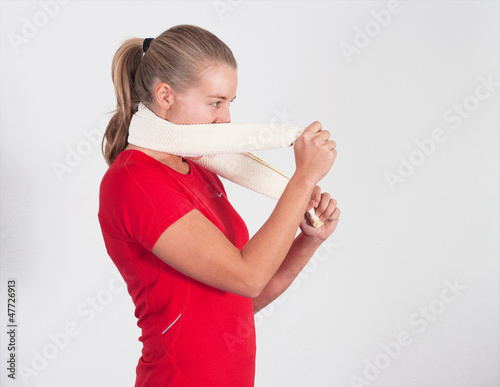 Photo: Blonde women with towel and red shirt Blonde women with towel and red shirt