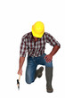 Tradesman using an axe