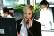 Busy blond office worker