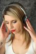 Woman listening to music with her headphones