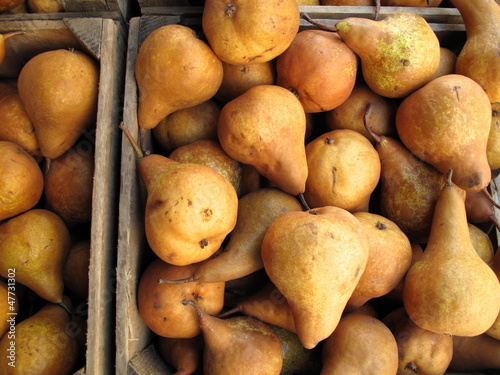 Photo: Boxes of organic Bosc pears for sale at farmers market Boxes of organic Bosc pears for sale at farmers market
