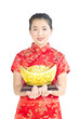 chinese woman wear cheongsam and holding gold ingot