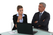 Boss and hiss young employee working together