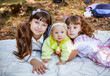 Photo: Happy little sisters in park Happy little sisters in park