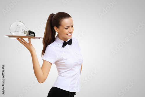 Photo: Waitress and bulb on th etray Waitress and bulb on th etray