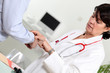 Photo: Doctor taking her patient's pulse Doctor taking her patient's pulse