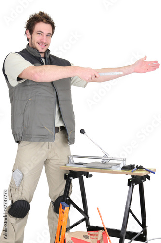 Photo: Tile cutter gesturing Tile cutter gesturing