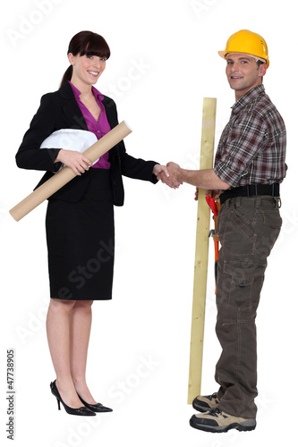Photo: businesswoman and craftsman businesswoman and craftsman