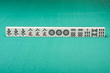 Smooth table surface with a mahjong on it