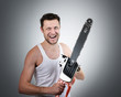 Man with electric saw